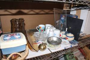 lot 209 image: Salt and Pepper Shakers, Glass Juicer, Glass Pitcher, CD Rack