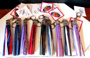 lot 349 image: CHARM 14 OF NEW YORM TASSEL KEYCHAINS - NEW WTAGS (9 ASSORTED COLORS)