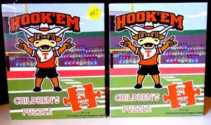 lot 437 image: PAIR OF UNIVERSITY OF TEXAS HOOK EM CHILDRENS PUZZLES - NEW SEALED