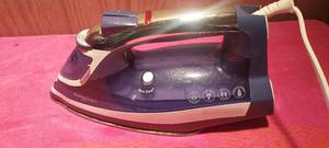 lot 43 image: Black and Decker Eversteam iron.  Works