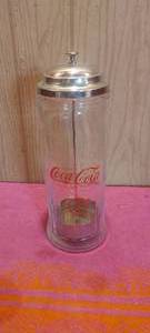 lot 76 image: 11 glass Coca-Cola Canister
