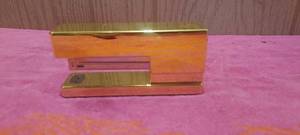 lot 89 image: Martha Stewart gold toned stapler