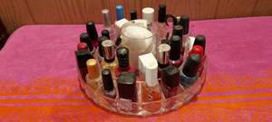 lot 94 image: Nail polish carousel with lots of full bottle nail polishes