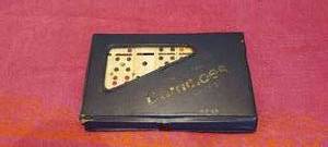lot 107 image: set of double 6 standard dominoes