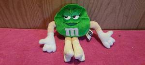 lot 117 image: Green M&M 8 plush doll