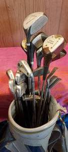 lot 138 image: miscellaneous golf clubs and bag