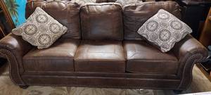 lot 161 image: Brand new Ashley Furniture leathersuede 3 cushion sofa  Excellent condition  match to lot 160