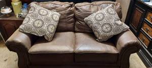 lot 160 image: Brand new Ashley Furniture leathersuede 2 cushion love seat Excellent condition