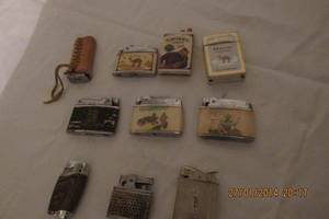lot 70 image: VINTAGE  CAMEL BUTANE LIGHTERS AS WELL AS CARTOON-SEE PICS