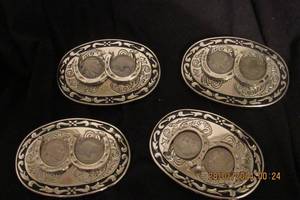 lot 132 image: WESTERN BUFFALO NICKLE BELT BUCKLES-NICKLE AND STERLING SILVER WITH BLACK INLAY OVAL 4.5 X 3 APPROX