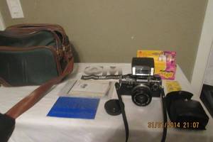 lot 159 image: OLYMPUS OM10 FC 35MM CAMERA WITH ACCESSORIES AND CASE