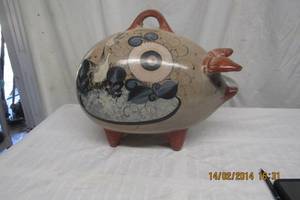 lot 220 image: LARGE CLAY FIRED PIGGY BANK- 14T X 16L X 9D HAND PAINTED-
