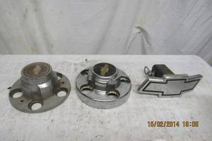 lot 46 image: CHEVY HUB CAPS DIFFERENT AND HITCH CAP