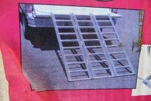 lot 49 image: HAUL MASTER 1500LB ALUMINUM RAMP NEVER OUT OF BOX