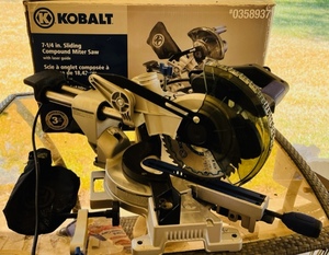 lot 1 image: 7 14 KOBALT SLIDING COMPOUND MITER SAW wLASER GUIDE