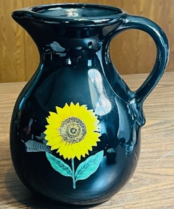lot 74 image: BLACK CERAMIC SUNFLOWER PITCHER 9