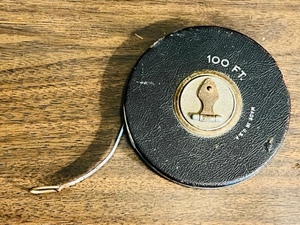 lot 186 image: VINTAGE 100FT TAPE MEASURE