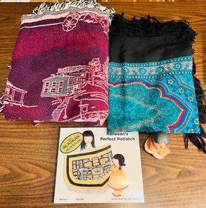 lot 198 image: 2 ALASKAN HANDMADE BLANKETS wNATIVE FIGURINES and ALASKAN ADVENTURE BOOK&nbsp