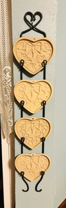 lot 233 image: COMPLETE SET OF PAMPERED CHEF FAMILY HERITAGE STONE WARE SEASONS OF THE HEART SERIES 2003 LIMITED EDITION COOKIESHORTBREAD MOLDS