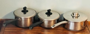 lot 316 image: 2 STAINLESS STEEL VINTAGE SEARS SAUCE PANS & ONE 3-PLY STAINLESS NORTINO SAUCE PAN