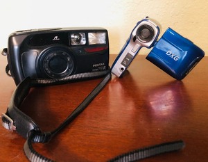lot 155 image: 2.4 LCD VIDEO CAMERA DXG-565V and PENTAX ZOOM 70-R CAMERA