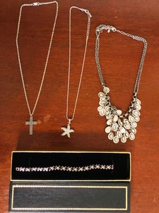 lot 156 image: 3 STAINLESS STEEL NECKLACES AND 1 BEAUTIFUL BRACELET