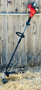 lot 369 image: HOMELITE GAS OPERATED WEED EATER
