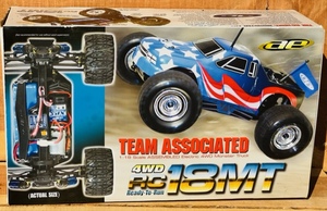 lot 102 image: AE TEAM ASSOCIATED 118 SCALE ASSEMBLED ELECTRIC RC 4WD MONSTER TRUCK