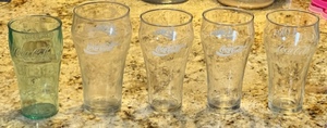 lot 124 image: 5 ASSORTED VINTAGE COCA-COLA GLASSES - 1 IS GREEN TINTED PLASTIC