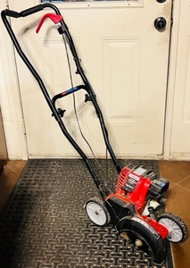lot 2 image: Troy-Bilt TB516 EC 29cc 4-cycle wheeled edger with jumpstart technology