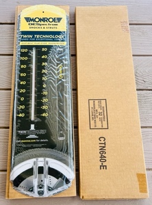 lot 61 image: Two New In Box Monroe Shocks Metal Hanging Thermometers 24x6.5