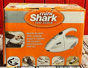 lot 153 image: Mini-Shark Euro-Pro Hand Vac WAttactments