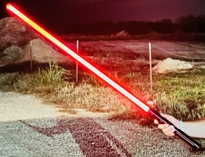 lot 31 image: 46 Star Wars Type Light Saber With Red Blade