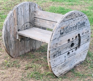 lot 34 image: General Cable Spool Repurposed Into Unique Outside Bench Seat