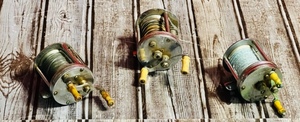 lot 78 image: Three Vintage Open-Face Fishing Reels South Bend No. 450-B  Pflueger Trump No. 1943  Shakespeare 1920 Wondereel