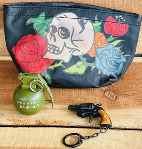 lot 190 image: Grenade Cigarette Lighter &amp Cap Shooting Key Chain Pistol In Awesome Skull Zipping Case