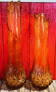 lot 192 image: Tall Vintage Mid-Century Viking Amber Swung Glass Pair of Vases 24in. &amp 21in.