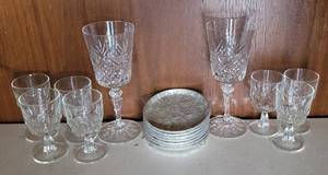 lot 28 image: VINTAGE EVERLAST FORGED ALUMINUM COASTERS AND ASSORTED GLASSWARE AS SHOWN.