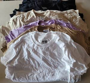 lot 52 image: LOT OF 24 T-SHIRTS IN ASSORTED COLORS, STYLES, AND SIZES AS SHOWN. PERFECT FOR PRINTING. (SOLD 24 X THE MONEY)