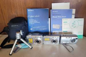 lot 58 image: SONY DIGITAL CAMERAS WITH TRIPOD, BAG, AND MORE AS SHOWN.