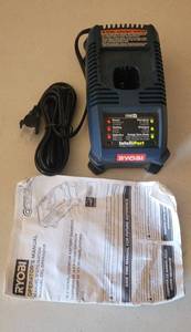 lot 61 image: RYOBI CLASS 2 BATTERY CHARGER MODEL P115 AS SHOWN.
