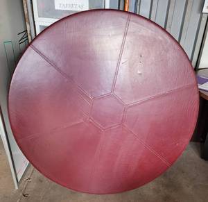 lot 87 image: ROUND LEATHER-STYLE OFFICE TABLE WITH SOLID HEAVY MARBLE BASE AS SHOWN. SEE PICTURES. DISASSEMBLED.
