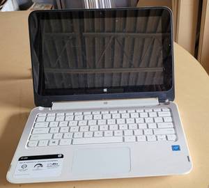 lot 113 image: HP LAPTOP MODEL 11--P110NR AS SHOWN. NO POWER CORD.