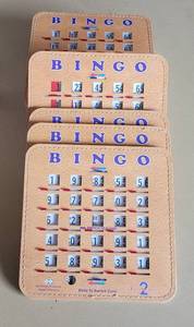 lot 114 image: LOT OF 12 DOUBLE-CARD BINGO CARDS AS SHOWN. (SOLD 12 X THE MONEY)