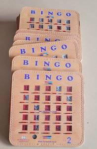 lot 115 image: LOT OF 12 DOUBLE-CARD BINGO CARDS AS SHOWN. (SOLD 12 X THE MONEY)