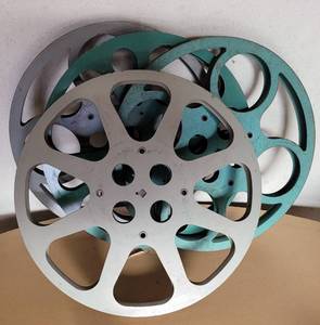 lot 126 image: LOT OF 4 VINTAGE METAL MOVIE FILM REELS AS SHOWN. (SOLD 4 X THE MONEY)