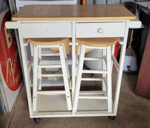 lot 129 image: KITCHEN ISLAND WITH STOW-AWAY STOOLS IN STYLE SHOWN.
