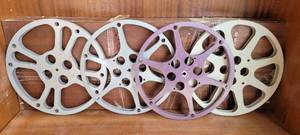 lot 135 image: LOT OF 4 VINTAGE METAL MOVIE FILM REELS AS SHOWN. (SOLD 4 X THE MONEY)