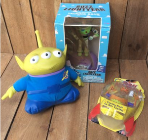 lot 14 image: Disney Buzz Lightyear Talking Bank - Disney Alien Plush - Jimmy Neutron Yokian King
