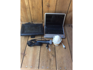 lot 74 image: Assorted Electronics (Guitar Hero Microphone - Electronic Picture Frame - Small Laptop- Rock Salt Lamp) All Untested